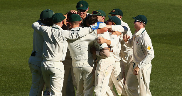Australia celebrate after retaining the Frank Worrell Trophy on the fourth day in Melbourne.