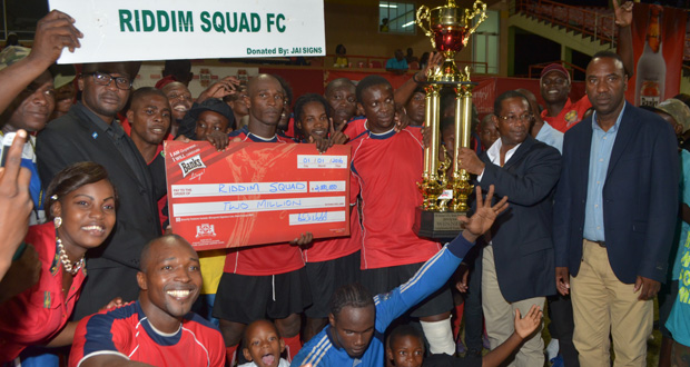 The victorious Riddim Squad side celebrate with their first GFA/Banks Beer championship trophy and prize money (Cullen Nelson Photo)