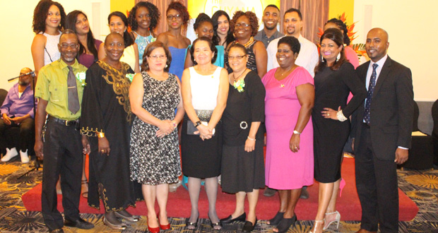 First Lady Mrs. Sandra Granger, (centre) is flanked by Guyana Foundation Founder Ms. Supriya Singh-Bodden (second from right) and Managing Director, Anthony Outar, volunteers and other members.