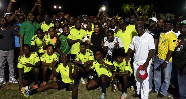 Picture shows at right, GT Beer Brand Manager Jeoffrey Clement and second right Ms. Shondel Easton with the Winners Connection team celebrating after their win