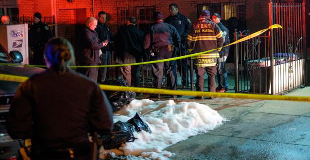 Firefighters found the victim, identified by family as Sunildatt Seudatt, already dead outside his apartment house. (New York Daily Post photo)