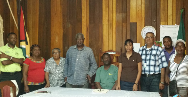 Mr. Winston Hope, (sitting in the chair) is the Mayor of RHT; to his left is the Deputy Mayor, Mr. R. King. Mr Harbhajan, third from right, is seen with some of the councillors and community stakeholders at the meeting