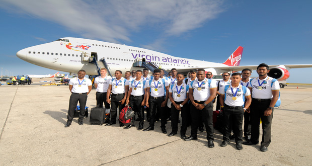 The West Indies team shortly after their arrival in Barbados on Tuesday night.