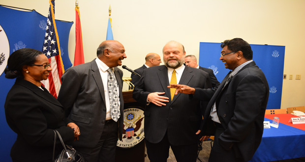 ALL SMILES : U.S. Ambassador Perry Holloway (second right) shares a light moment with Minister of Public Security Khemraj Ramjattan (r), Chancellor of the Judiciary, Carl Singh (second left) and Chief Justice (ag) Justice Yonnette Cummings-Edwards (left)