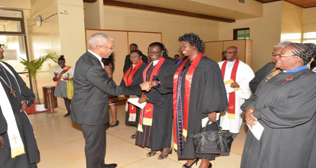 President Granger meeting the ministers and leaders of the Congregational Church on his arrival at the National Cultural Centre for the anniversary celebration (Ministry of the Presidency photo)
 