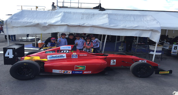 Calvin Ming takes a photograph with a few of his fans after narrowly missing out on the podium at the third round of the F4 Championships in Mexico