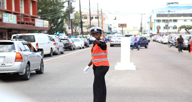 An officer of the M&CC Traffic Management Unit on duty yesterday on Regent Street