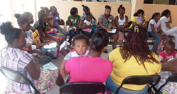 A group of teenage mothers at a session facilitated by WAD