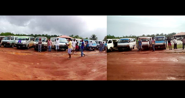 Some of the mini-bus operators and their vehicles at Mabaruma yesterday morning