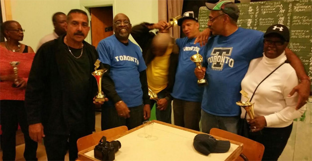 The Scarborough Dominoes Club (SDC) players in a celebratory mood following their victory in Montreal last October.