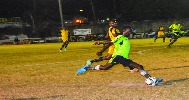 Part of the action between Police and Flamingo at the GFC ground Wednesday evening in the GFA STAG Premier League. (Samuel Maughn photo)
