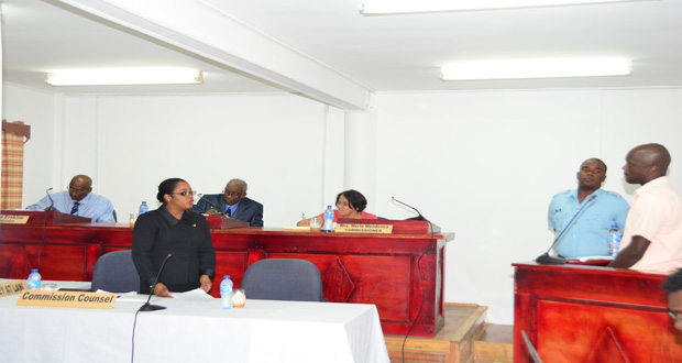 Murder accused Basil Morgan answering questions fielded by the Commission’s Counsel, Excellence Dazzell, yesterday