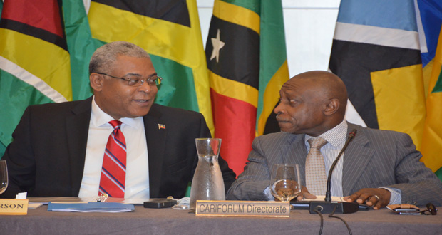 Guyana’s Third Vice President and Foreign Affairs Minister, Carl Greenidge and Chief of Cabinet of the President of Haiti Jean Max Bellerive in discussion during the 23rd Meeting of the Council of Ministers of CARIFORUM.