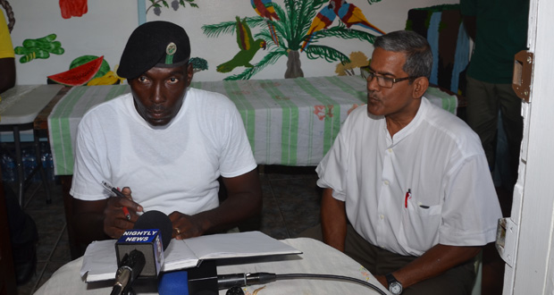 Prison Head Kevin Pilgrim and Chairman of the newly established Visiting Prisons Committee Rabindra Chand brief the media on Tuesday (Delano Williams photo)