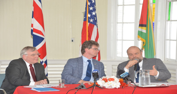 Canadian High Commissioner Pierre Giroux and British High Commissioner Greg Quinn listen in as U.S. Ambassador Perry Holloway makes a point at Monday’s press conference at which they hailed the conduct of Friday’s Local Government elections as being of international standard