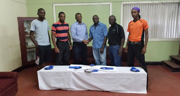 From left to right are Paul Jones, Shavin Greene, GTTA president Godfrey Munroe, LTTC chairman Howard James, Victor Wright and Maurice Cummings.