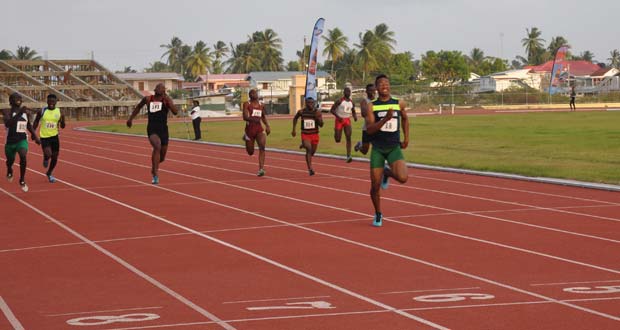Linden's Compton Caesar makes his way to the finish line for the win in the Boys' Under-20 200 metres.