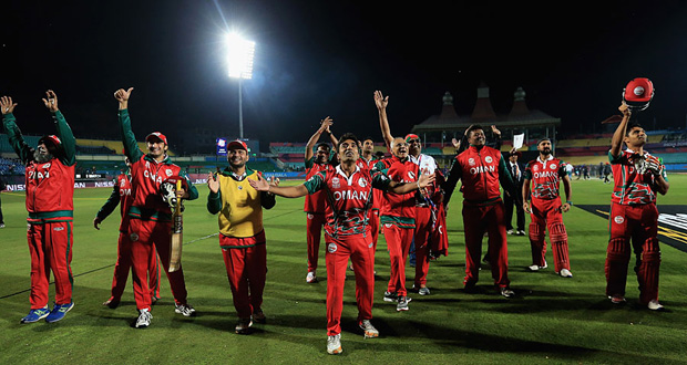 Oman players soak in their famous victory over Ireland in their World T20 qualifier, Group A, match on Dharamsala, yesterday.