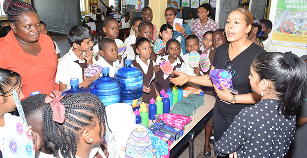 Mrs. Colleen Reis, right, interacting with students and teachers of the New Comenius School