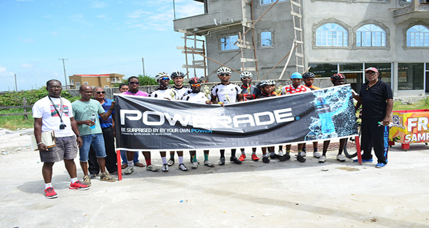 Winners of the various categories of the banks DIH’s Powerade cycle road race strike a pose with race organiser Hassan Mohamed (third left) and former national cycle champion Victor Rutherford (extreme right).