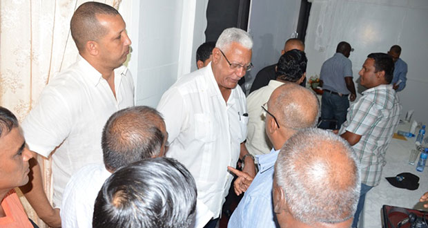 Agriculture Minister Noel Holder interacting with rice farmers after the meeting at the Skeldon Estate Training Centre