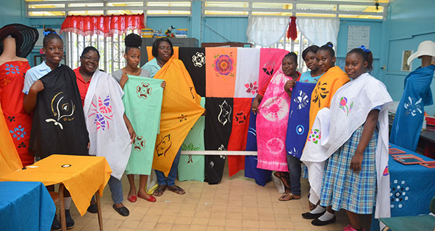 Teachers and students of the David Rose Special School displaying their fabric creations