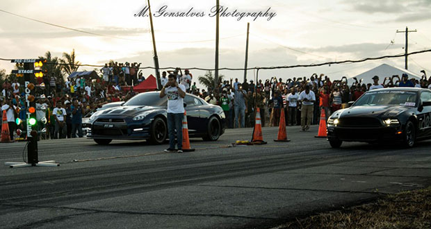 Guyanese dragster Asurdin Mohammed in his GTR (left) gets the jump on a Surinamese Ford Mustang (Michael Gonzalves photo)