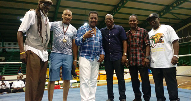 in photo from left to right are; Kenny Bristol, (first Guyanese to win a Commonwealth title on home soil); Winfield Braithwaite, (first Guyanese to win a Commonwealth Games gold medal); Lennox Blackmoore, (the first Guyanese to win a Commonwealth professional title on foreign soil); GBA president Steve Ninvalle,Michael Parris (Guyana’s only Olympic Games medalist) and head, Bris `O’ Promotions, Seon Bristol.