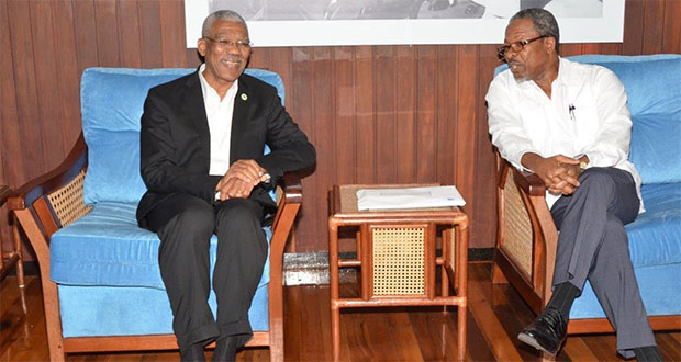 President David Granger and Professor Ivelaw Griffith share a light moment during their meeting at the Ministry of the Presidency.