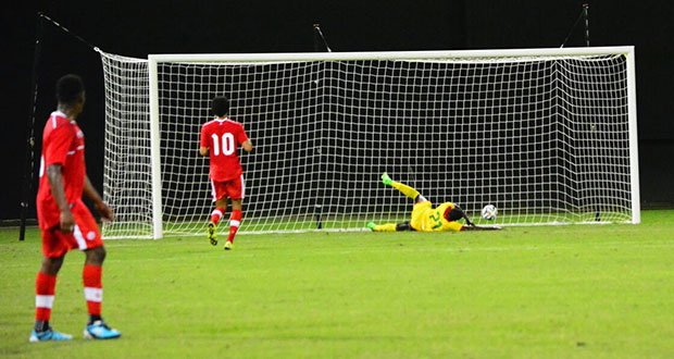A desperate slide from a Guyanese defender could not stop Canada's Richmond Laryea (Samuel Maughn Photo)