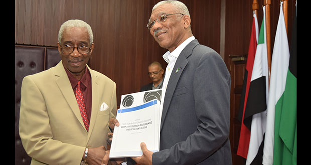 FLASHBACK: Chairman of the Georgetown Prison Riot CoI, Justice James Patterson, handing over the report to President David Granger on June 1 (Photo by Cullen Bess-Nelson)