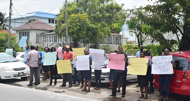 GT&T employees as they displayed their placards during the protest action.