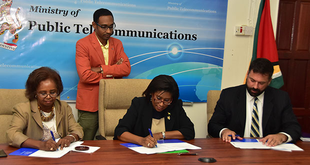 (Inked. (L-R) UNDP Country Representative Khadija Musa, Public Telecommunications Minister Cathy Hughes and Stephan Dieter of Detecon Consultancy signing the contract for the ICT needs assessment project at the Public Telecommunications Ministry on Friday