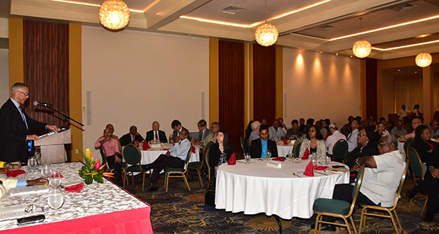 Minister of Business Dominic Gaskin delivering the feature address during the GMSA Business Luncheon at the Pegasus Hotel