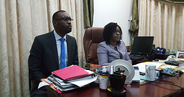 Director of Sport Christopher Jones (left) and Junior Minister of Public Health Dr Karen Cummings