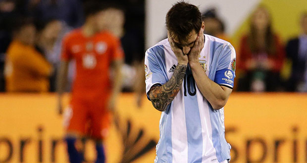 Argentina superstar Lionel Messi reacts after his miss during the penalty-kicks phase of Sunday' NIGHT’S Copa final.
