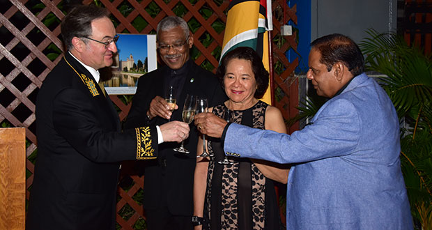 Cheers! Russia’s Ambassador Nikolay Smirnov, President David Granger, First Lady Sandra Granger and Prime Minister Moses Nagamootoo toast to the continued strengthening of relations between Guyana and Russia