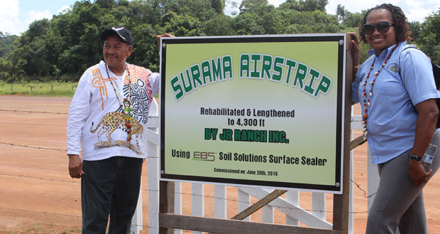 Minister of Indigenous Affairs Sydney Allicock and Minister within the Ministry of Public Infrastructure Annette Ferguson pose at the recommissioned Surama Airstrip in Region 9