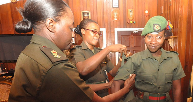Corporal Ross-Cox being decorated with her new badge of rank by Lieutenant Colonels: Lorraine Foster (left) and Natasha Stanford (GDF photo)