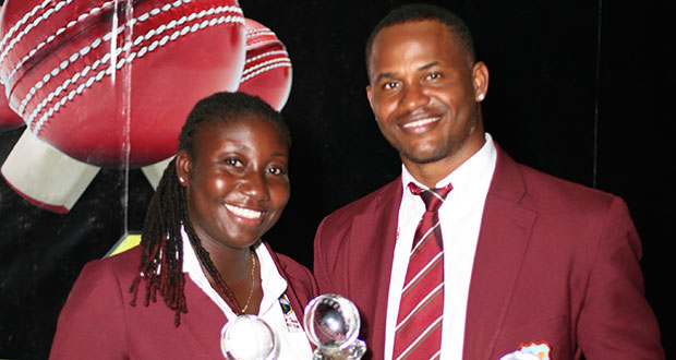 Marlon Samuels (right) and Stafanie Taylor pose with their trophies after sweeping the top awards at the WICB/WIPA Awards Ceremony Tuesday night.