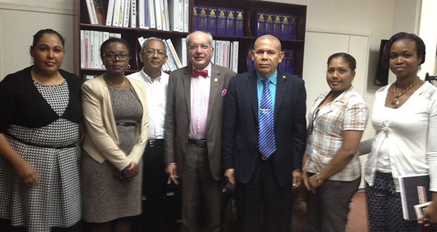 From left: Dr Kavita Singh, Coordinator of the Chronic Disease Programme; Dr Karen Boyle, Deputy Chief Medical Officer; Dr Carl Niamatali; Professor Chittaranjan Narahari Purandare; Dr George Norton, Minister of Public Health; Sarah Daniels, Senior Medex; and Dr Ertenisa Hamilton, Director (ag) of Maternal Child Health Programme