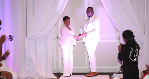 Francois receives his award at the 7th Annual Caribbean Style & Culture Awards & Fashion Showcase last month