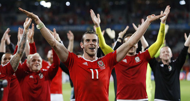 Gareth Bale leads the Welsh celebrations. (Reuters)