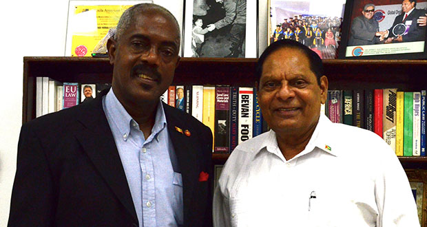 Prime Minister, Moses Nagamootoo poses for a photo with Mr Chester Humphrey at his office Wednesday