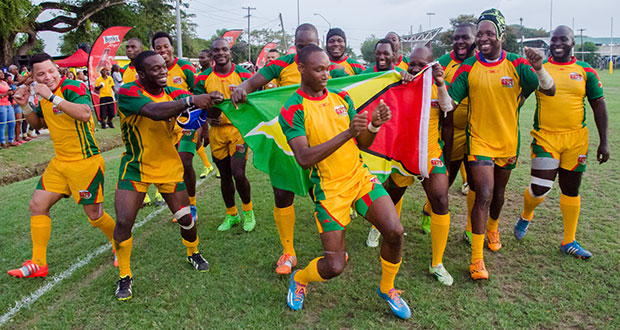 Flashback! The victorious Guyana team celebrate after ‘frying’ Barbados 48-17 at the National Park during the earlier stages of the Rugby America North (RAN) South Zone Finals. (Delano Williams photo)