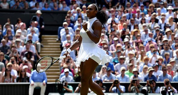 Serena Williams celebrates winning her match against Russia's Elena Vesnina at the All England Lawn Tennis & Croquet Club, Wimbledon, England yesterday. (REUTERS/Toby Melville)
