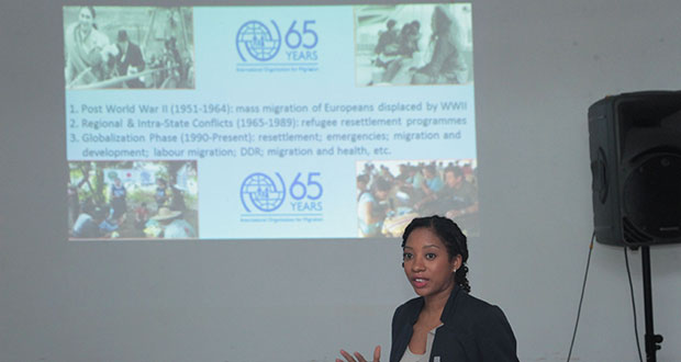 One of IOM’s representatives briefing participants on the history of the organisation (Aubrey Odle)