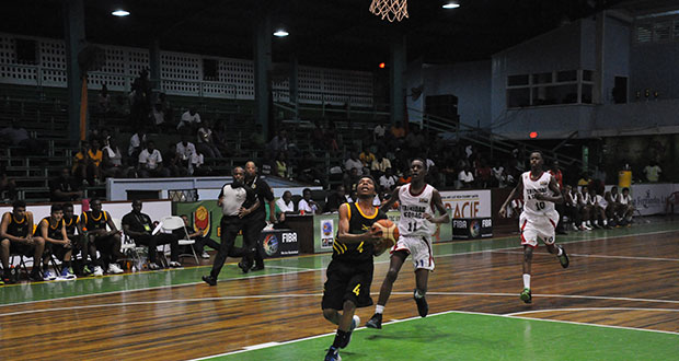 Jamaica’s Jalen Menzies goes for a layup.