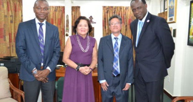 First Lady, Mrs. Sandra Granger is flanked by, from L-R: Mr. Dion Inniss, Caribbean Airlines’ Guyana and Suriname Sales Representative; Mr. Tyrone Tang, Chief Executive Officer and Mr. Carl Stuart, South America Manager