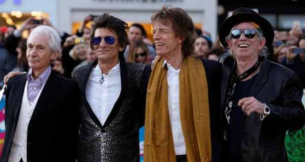 Members of the Rolling Stones (L-R) Charlie Watts, Ronnie Wood, Mick Jagger and Keith Richards arrive for the ''Exhibitionism'' opening night gala at the Saatchi Gallery in London, Britain April 4, 2016.
